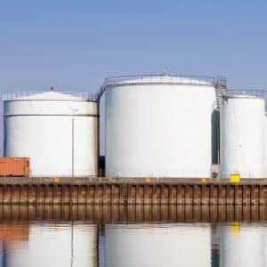 The image displays a vertical carbon steel welded tank, available in custom sizes.