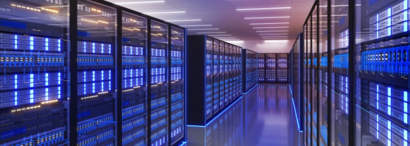 The image shows a data center featuring multiple rows of fully operational server racks.