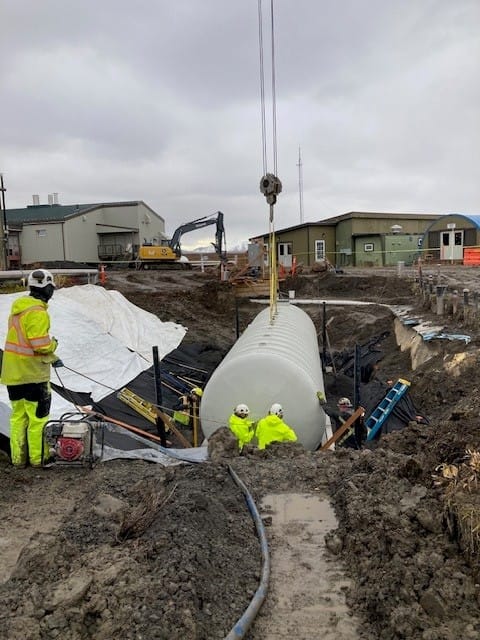 Setting fiberglass Tank into Excavated hole