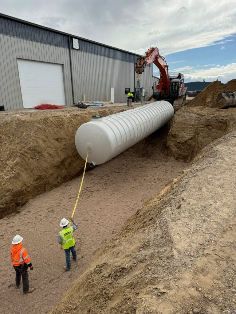 Excavator Walking Tank into Hole